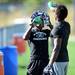 Pioneer's VaShon Davis takes a water break with a teammate during a morning practice at Pioneer High School on Monday. Melanie Maxwell I AnnArbor.com